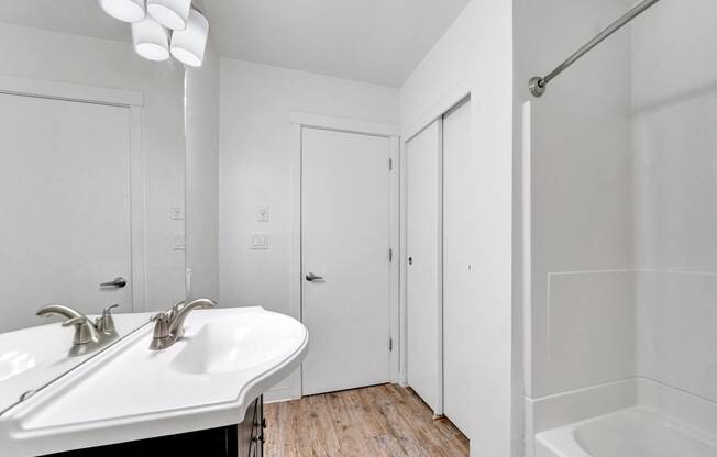 a bathroom with a sink and a bathtub