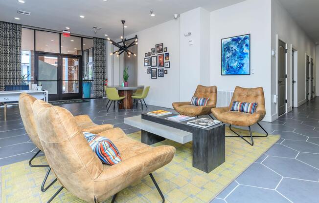 a living room filled with furniture and a large window