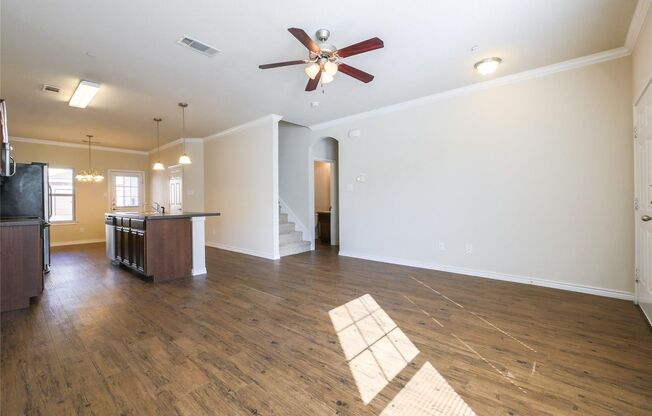 MOVE-IN SPECIAL! Spacious 4-Bedroom Townhome! This beautiful 4 bedroom, 2.5 bathroom townhome offers an open-concept layout designed for modern living.
