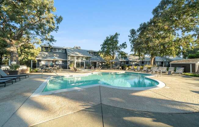 Refreshing swimming pool and lounge chairs at Bay Village, Vallejo, California