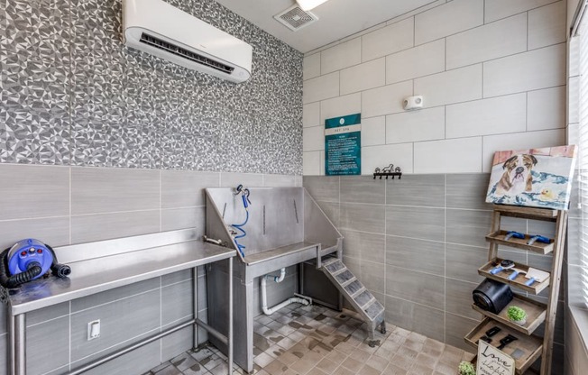 A bathroom with a shower and a toilet.