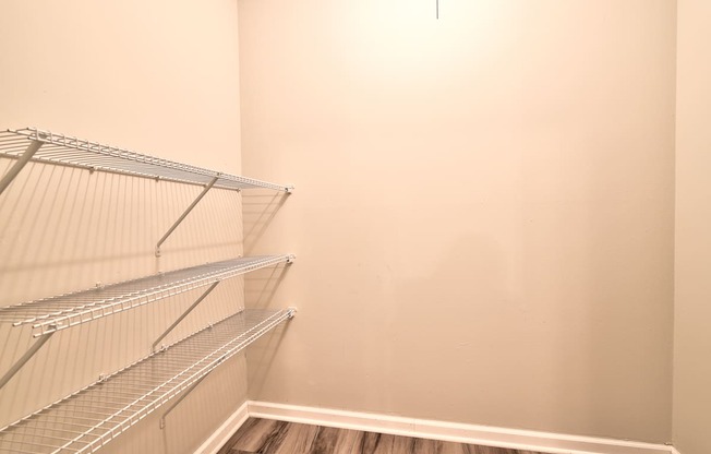 Walk-In Closets With Built-In Shelving at Glen Hills Apartments, Wisconsin