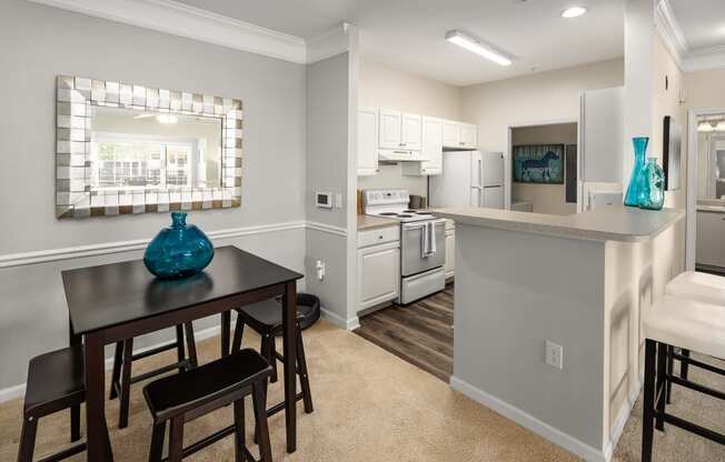 Dining Area and Kitchen at Abberly Woods Apartment Homes, Charlotte, North Carolina