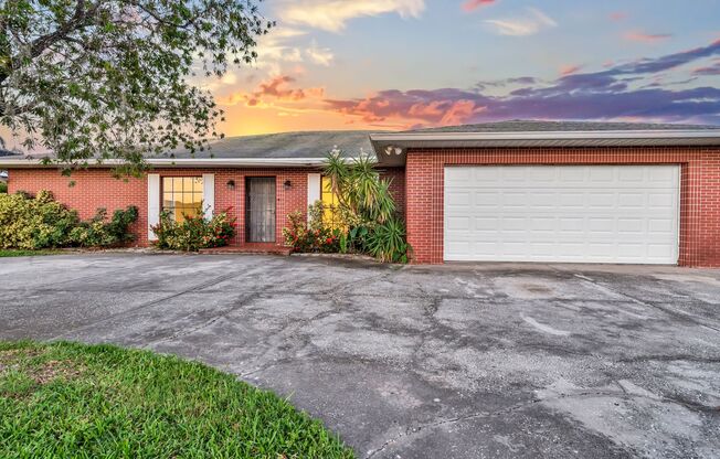 Canal-Front Oasis: Spacious 3-Bedroom Home with Screened Porch & Waterfront View!