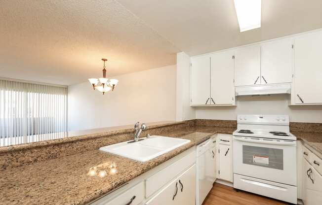 Kitchen with White Appliances and White Cabinets