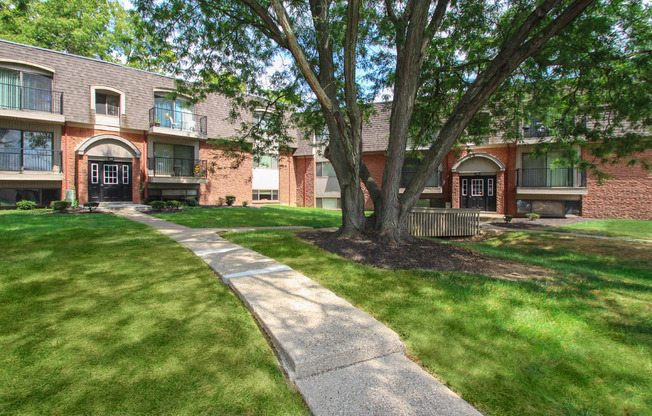 This is a photo of a walkway leading to an apartment building at Village East Apartments in Franklin, OH.