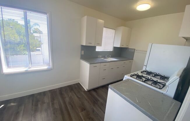 Upstairs 1 bedroom 1 bath unit with a one car garage included.