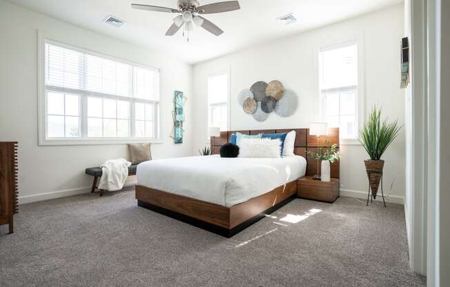 Bedroom with a bed and two windows  at Hadley Place Apartments, Pennsylvania, 17025