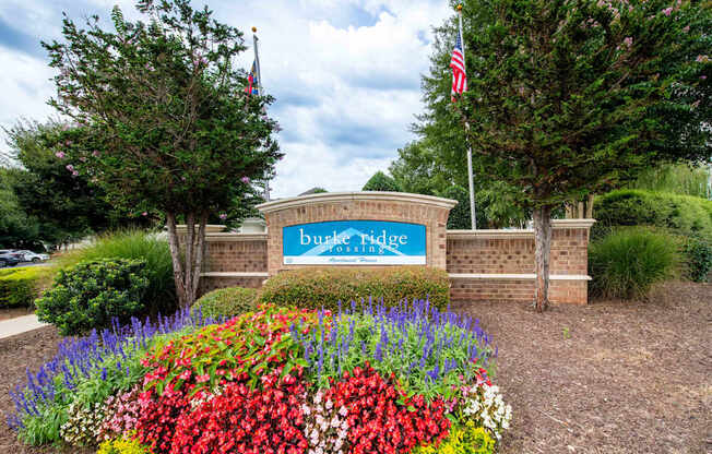 A sign that says Buckeye Ridge in front of a building.