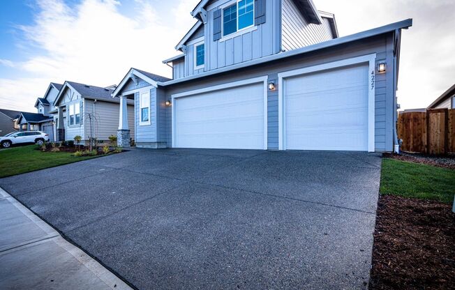 Gorgeous 4 Bedroom House with 3- Car Garage, Ring Doorbell & Fully Fenced Yard!