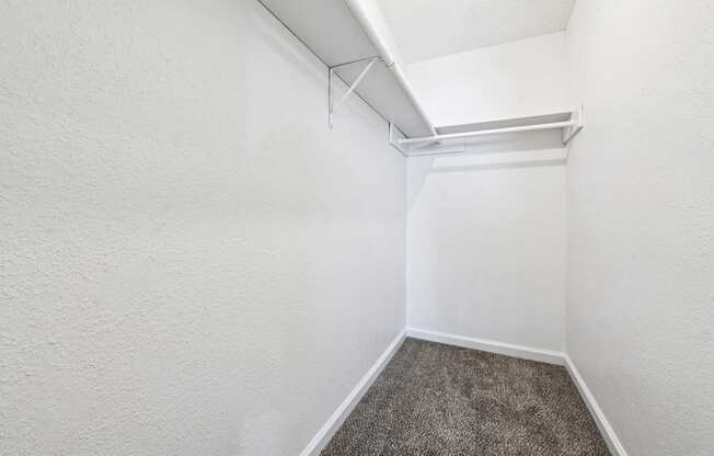 A white wall with a white ceiling and a white floor.