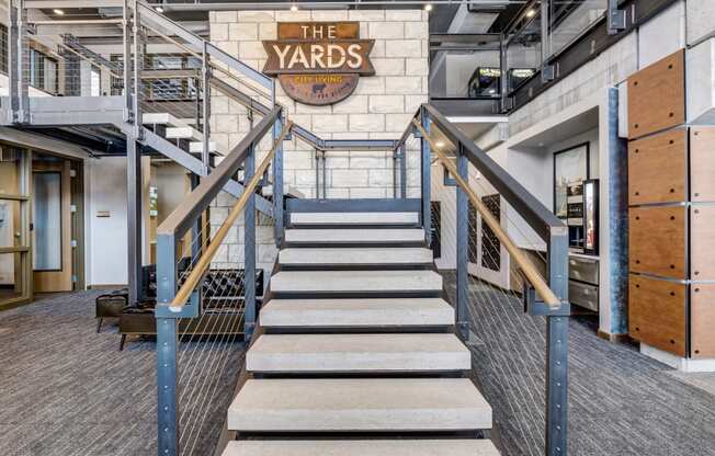 a staircase with a large sign that says the yards on the top of it at The Yards and Backyards, Saint Paul, Minnesota  55075