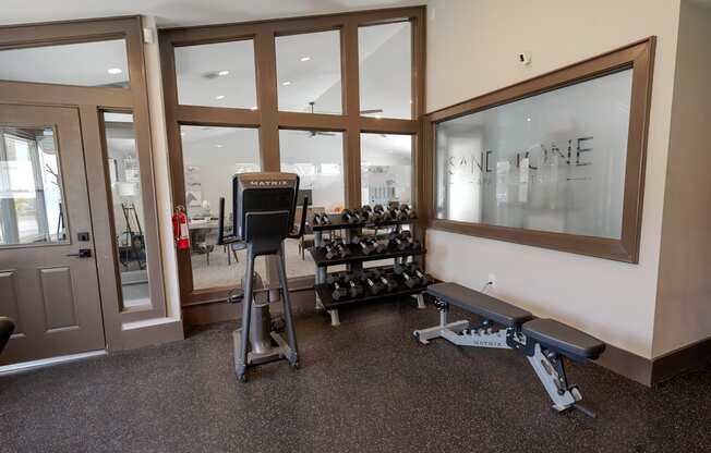 the gym at the flats at big tex apartments