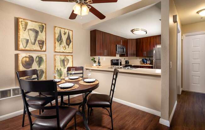 Dining room with a table and chairs and a kitchen