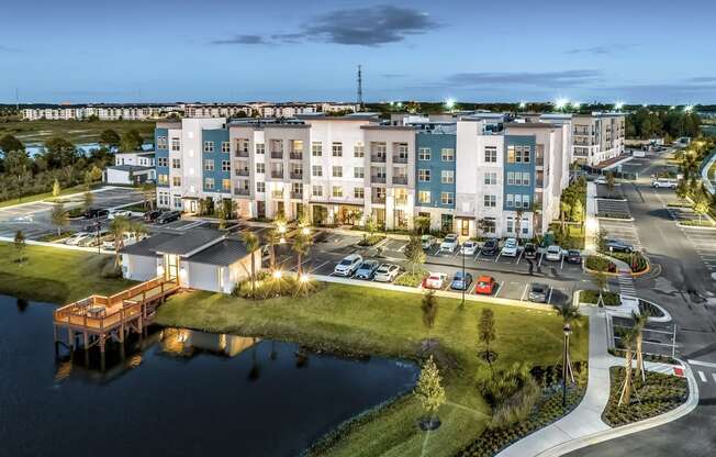 an aerial view of an apartment building overlooking a body of waterat The Overlook, Winter Garden