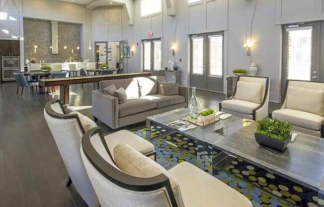 A modern living room with a long sofa and a coffee table.