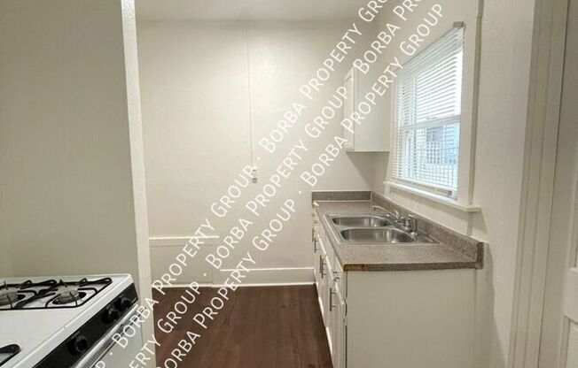 1074 OBISPO AVE