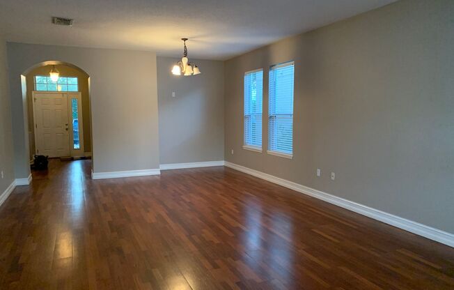 MOVE IN SPECIAL- Charming 3/2 home w/ formal office/4th bedroom and fenced yard in Harmony