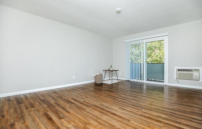 a living room with a wooden floor