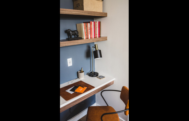 Built-in desk with USB ports and custom book shelves