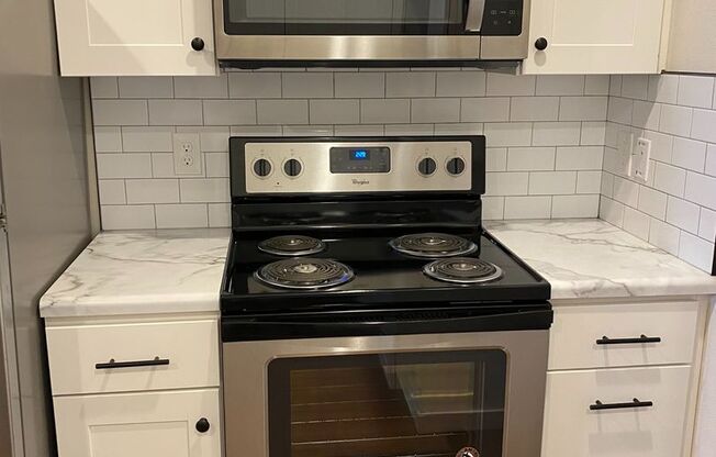 *** Completely GUTTED and REMODELED high-end 3 bedroom / 1 bath apartment