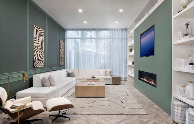 Library with Fireplace at The Marc Luxury Apartments in Palm Beach Gardens FL