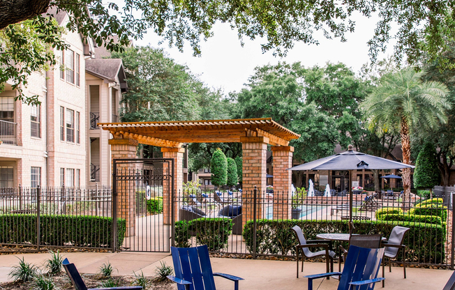 Relax while grilling with friends at this outdoor seating area under our massive live oak and crape myrtle trees.