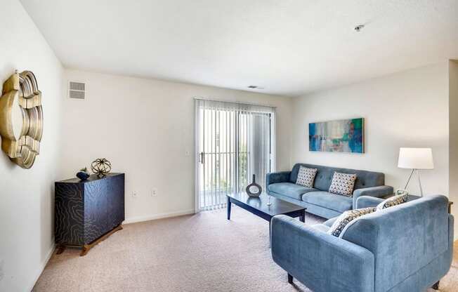 Living Room With Expansive Window at The Fields at Merrifield, Falls Church