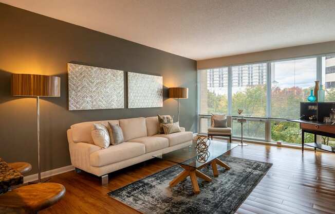 Living room with floor to ceiling windows