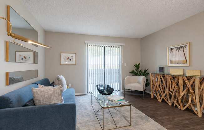 Living room with couch at Springhill Apartments, Overland Park