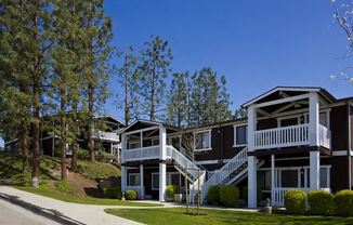 a row of houses on the side of a street