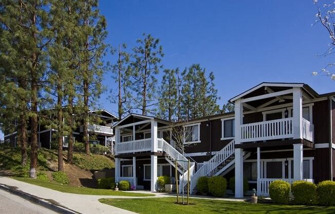 a row of houses on the side of a street