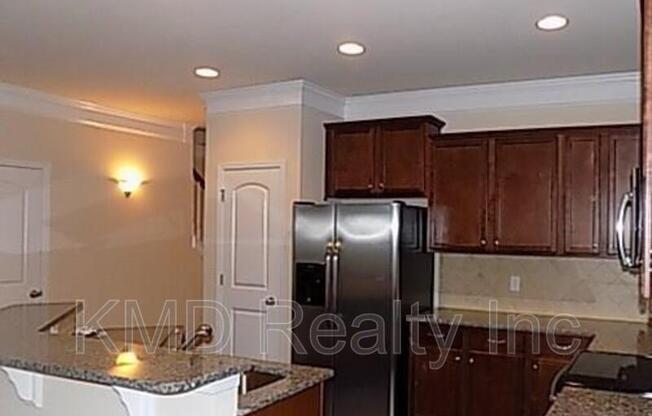 9590 CAMBERLEY AVE NW