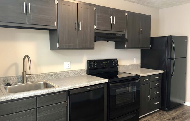 a modern kitchen with stainless steel appliances