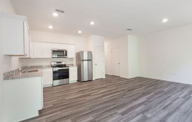 Newly Constructed 3/2.5 Townhome w/ Private Patio and Garage!