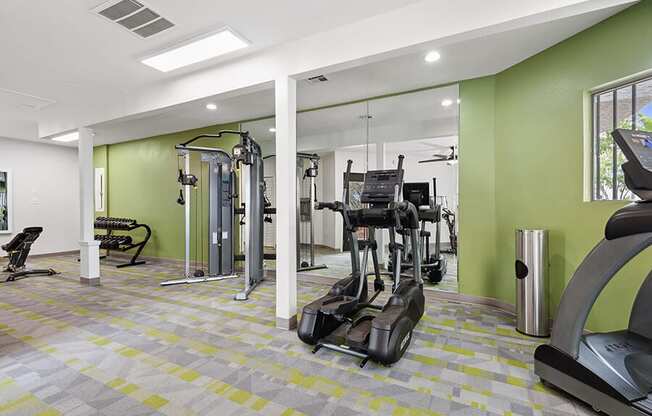 Community Fitness Center with Equipment at Crystal Creek Apartments in Phoenix, AZ.