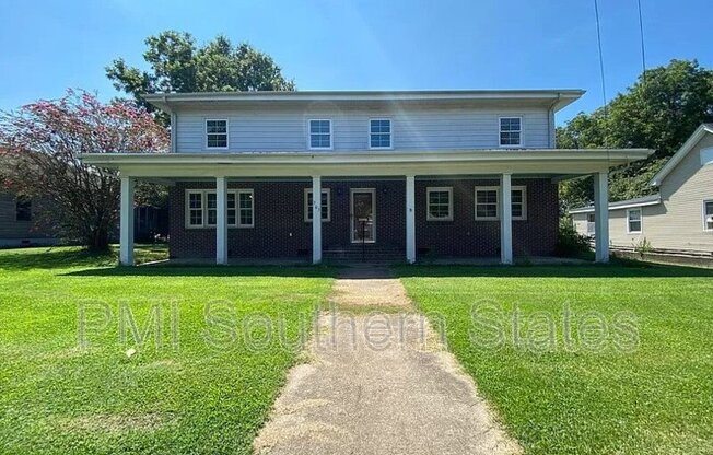 303 W BUFORD ST