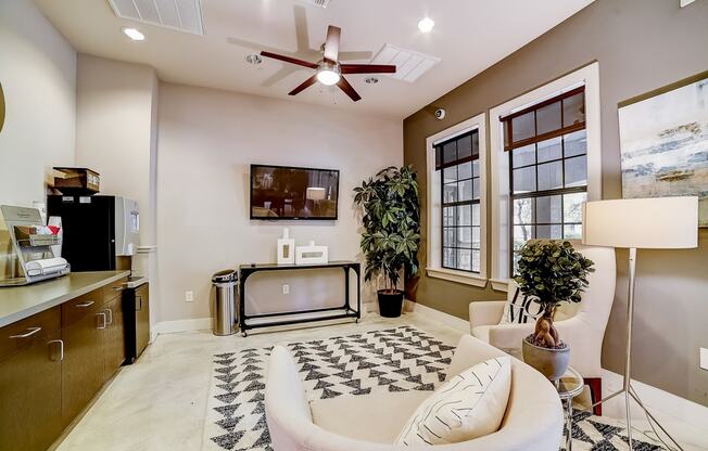 a living room with a couch and a tv