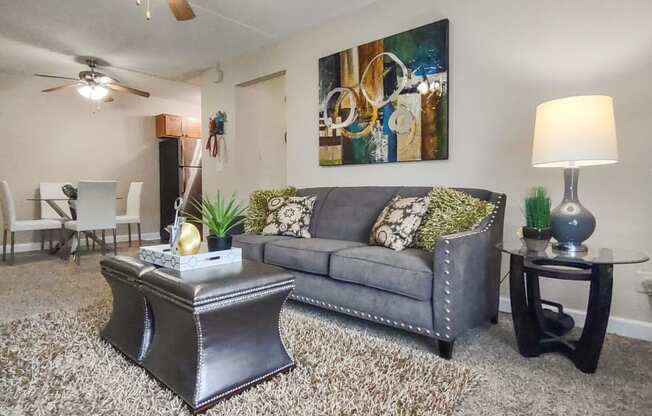 a living room with a couch and a coffee table