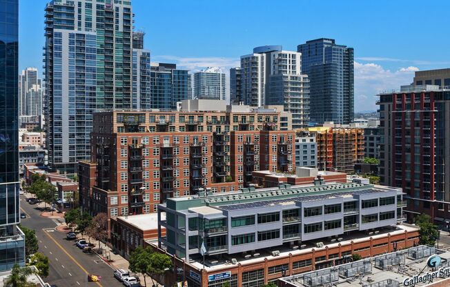 Expansive East Village loft at Parkloft, available now! 1 parking space included! Small pet OK!