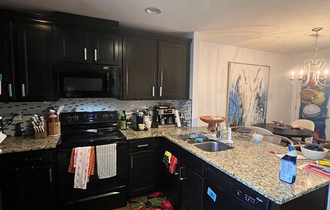 Townhome in Villages of Riverwood, Upgrades include Granite, Hdwd Floors, 1 Car Garage, Community Pool and Fitness