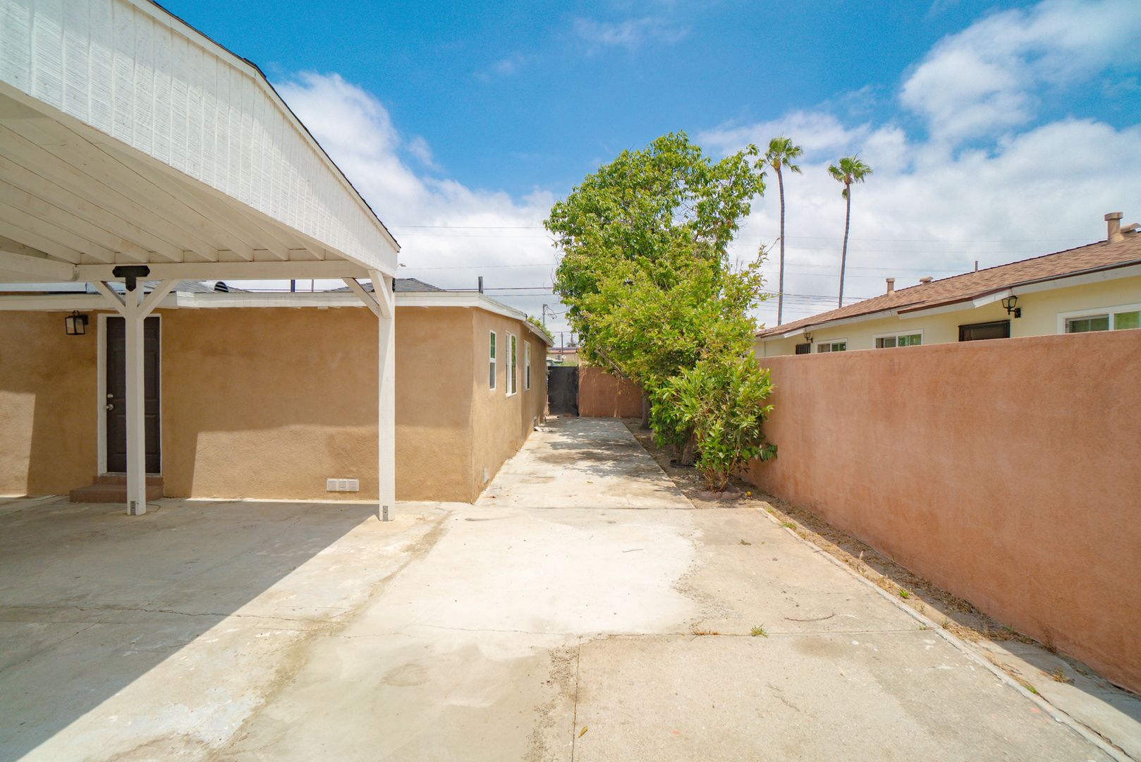 RECENTLY REMODELED, BRIGHT & AIRY 3BR2BA HOUSE ON SPACIOUS CORNER LOT W/ LARGE WRAP AROUND YARD & PATIO AREAS, GATED DRIVEWAY W/  LARGE COVERED CARPORT CLOSE TO SCHOOLS, PARKS, SHOPPING & EASY FREEWAY ACCESS!