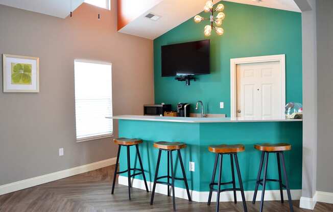 Clubhouse kitchen with counter height bar stool seating