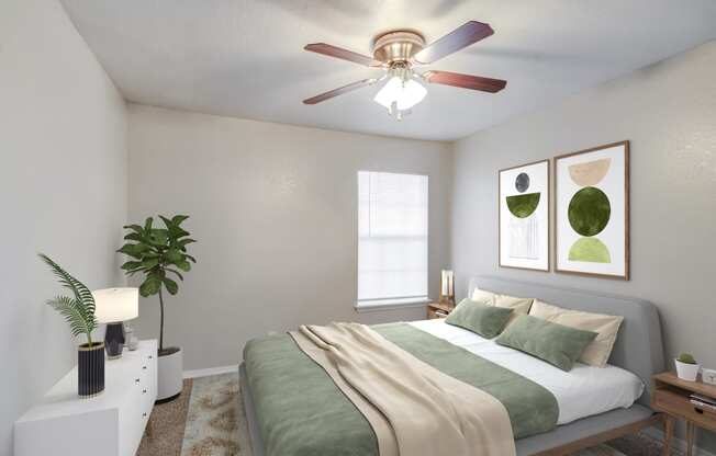 an empty bedroom with a bed and a ceiling fan