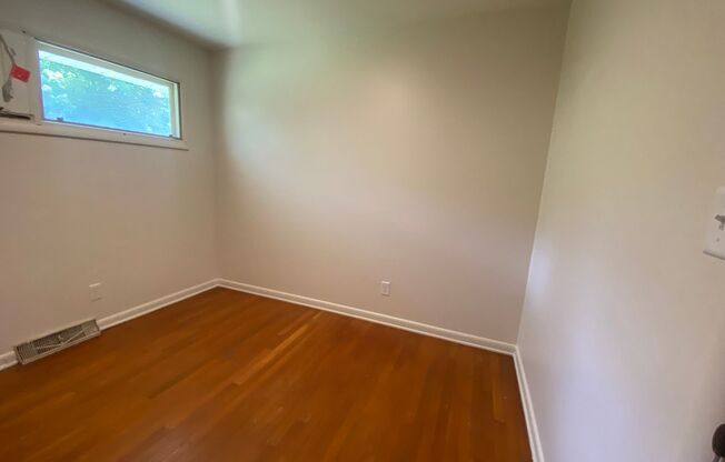 Charming 3-Bed Rental Home with Wood Floors & Serene Backyard!