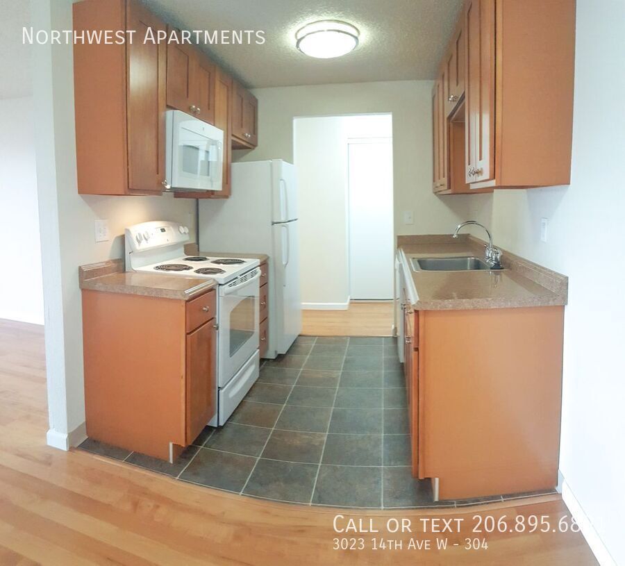 3023 14 AVE W