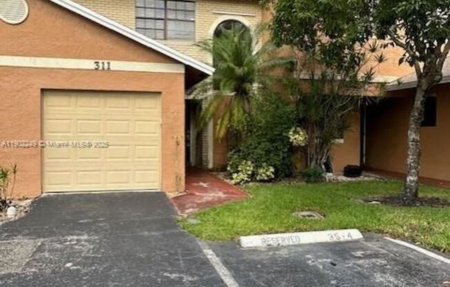 311 NW 103RD TER PEMBROKE PINES, FL 33026-