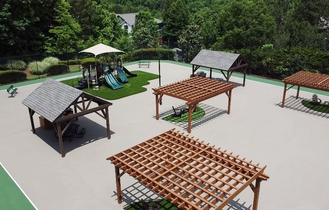 a rendering of a park with benches and a playground