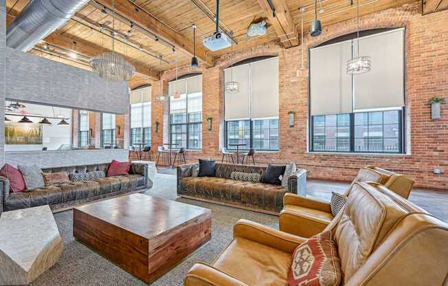 a large living room with couches and a coffee table