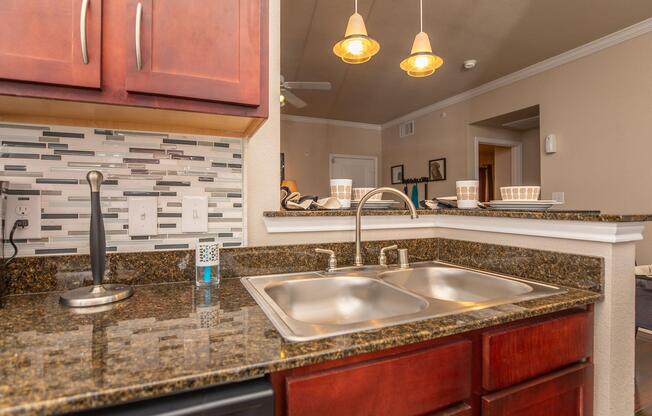 a kitchen with a sink and a counter